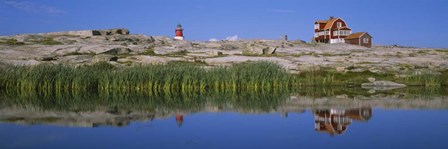 Reflection Of A Lighthouse, Sweden by Panoramic Images art print