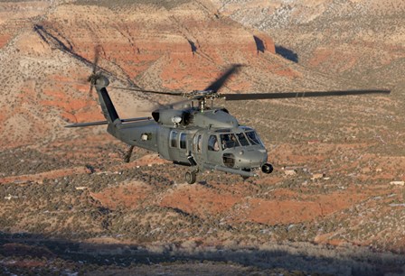 HH-60G Pave Hawk Flies a Low Level Route in New Mexico Mountains by HIGH-G Productions/Stocktrek Images art print